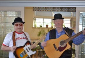 Musicians holding guitars